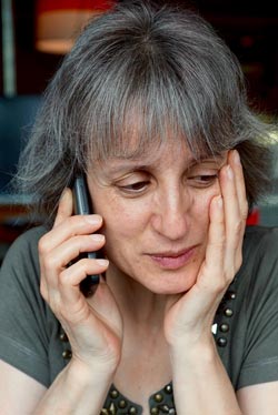 woman at phone with attorney