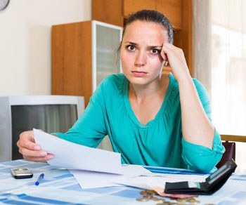 Woman worried about her debts